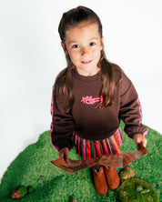 Donkerbruine sweater met roze mouwbies | Brown